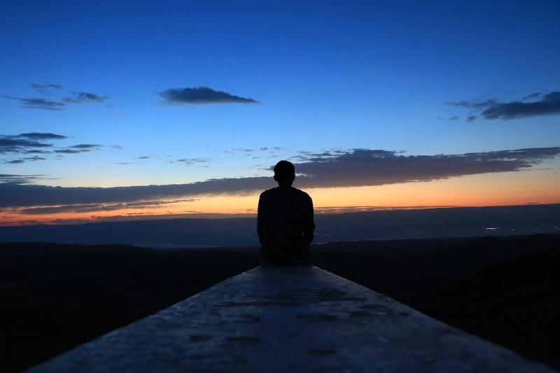 Man watching the sunrise