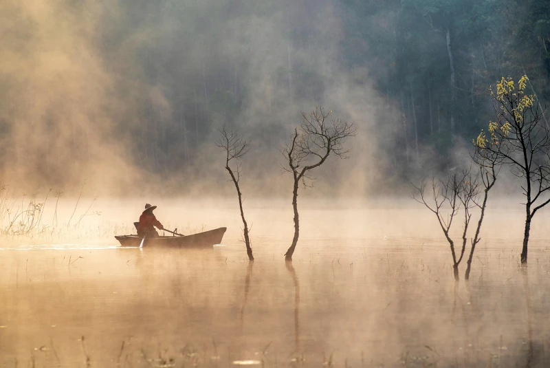 Photo of Vietnamese Fisherman on the water